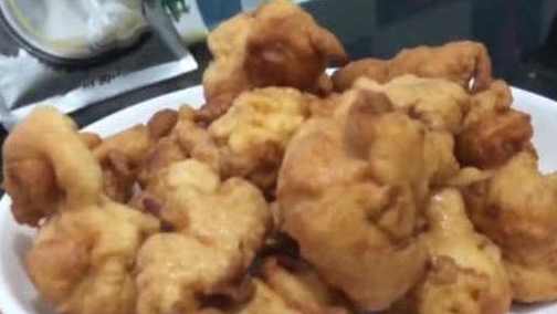 【舌尖上的年味!炸酥肉吃长菜,云南人的年夜饭记忆】在云南文山的习俗里,年夜饭必备的就是炸酥
